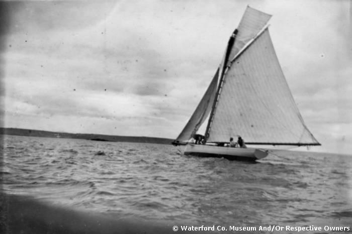Sailing Boat Taking Part In A Regatta At Helvick Head