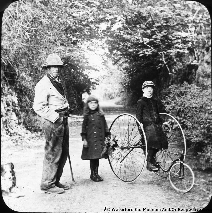 Brenan Children, Tricycle And Country Working Man.