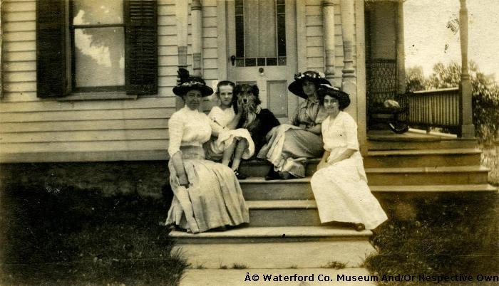 Group Photograph Taken On A Porch