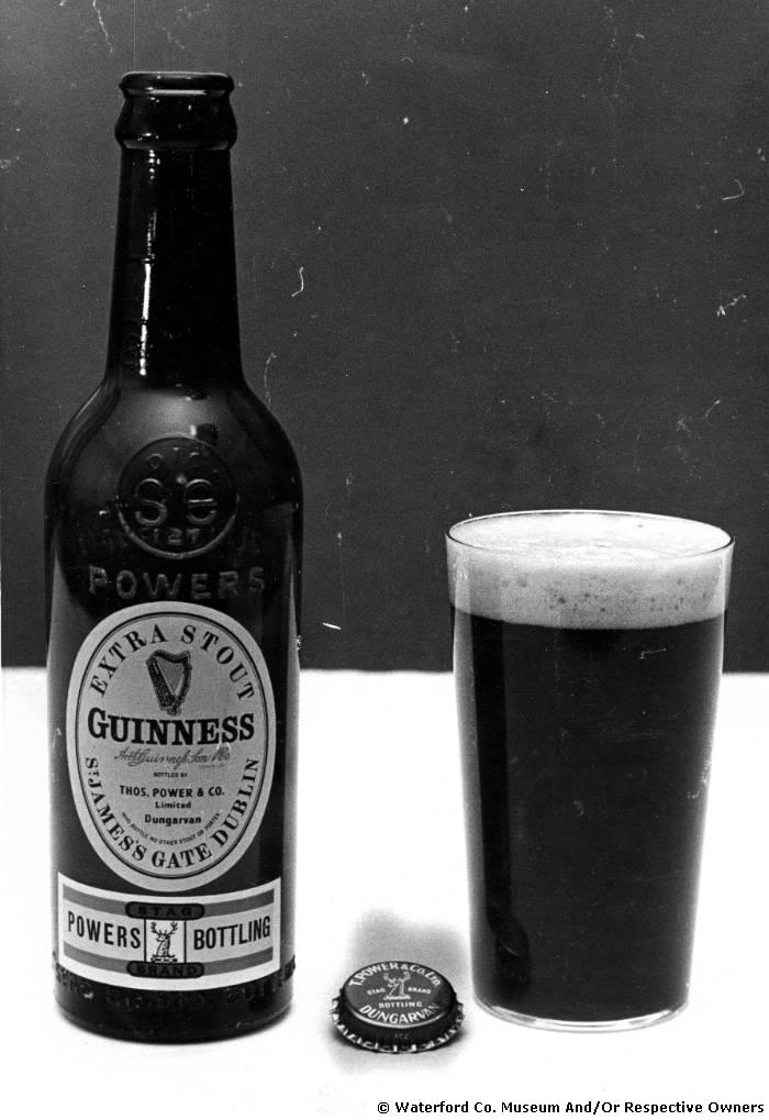 Bottle And Glass Of Power's Bottled Extra Stout Guinness